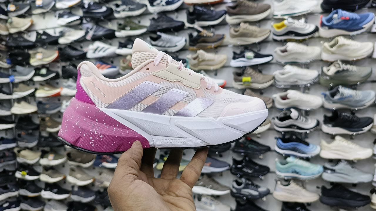 Skechers pink purple women's running sneaker front and back view on white background showing magenta speckled midsole